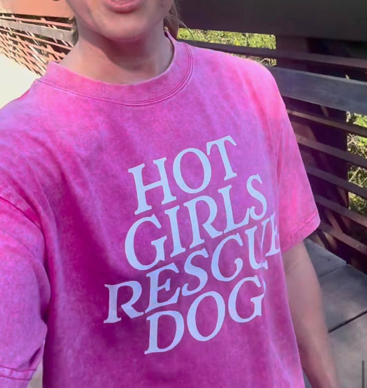 Person wearing a pink t-shirt with 'HOT GIRLS RESCUE DOG' text.