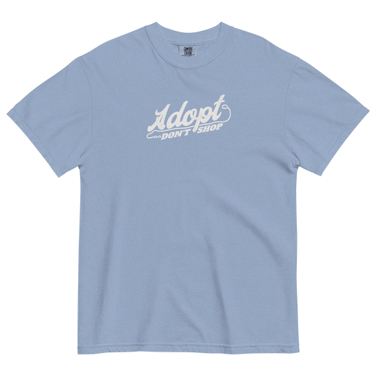 Light blue t-shirt with 'Adopt Don't Shop' text on a black background