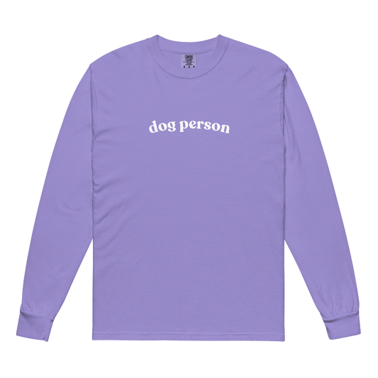 Purple long-sleeve shirt with 'dog person' text on a green background